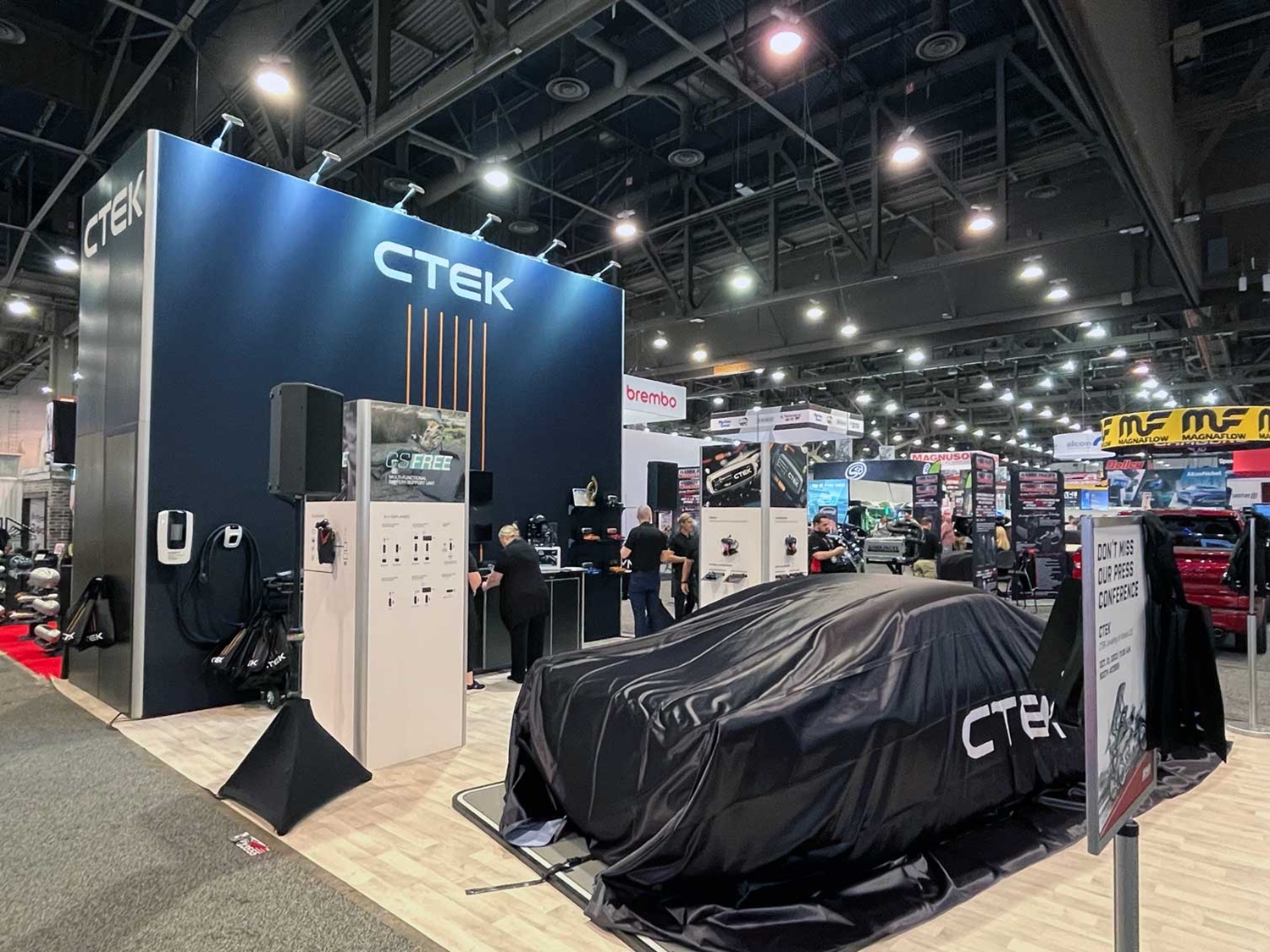 Image of CTEK at SEMA from 2023 with SEMA logo on top